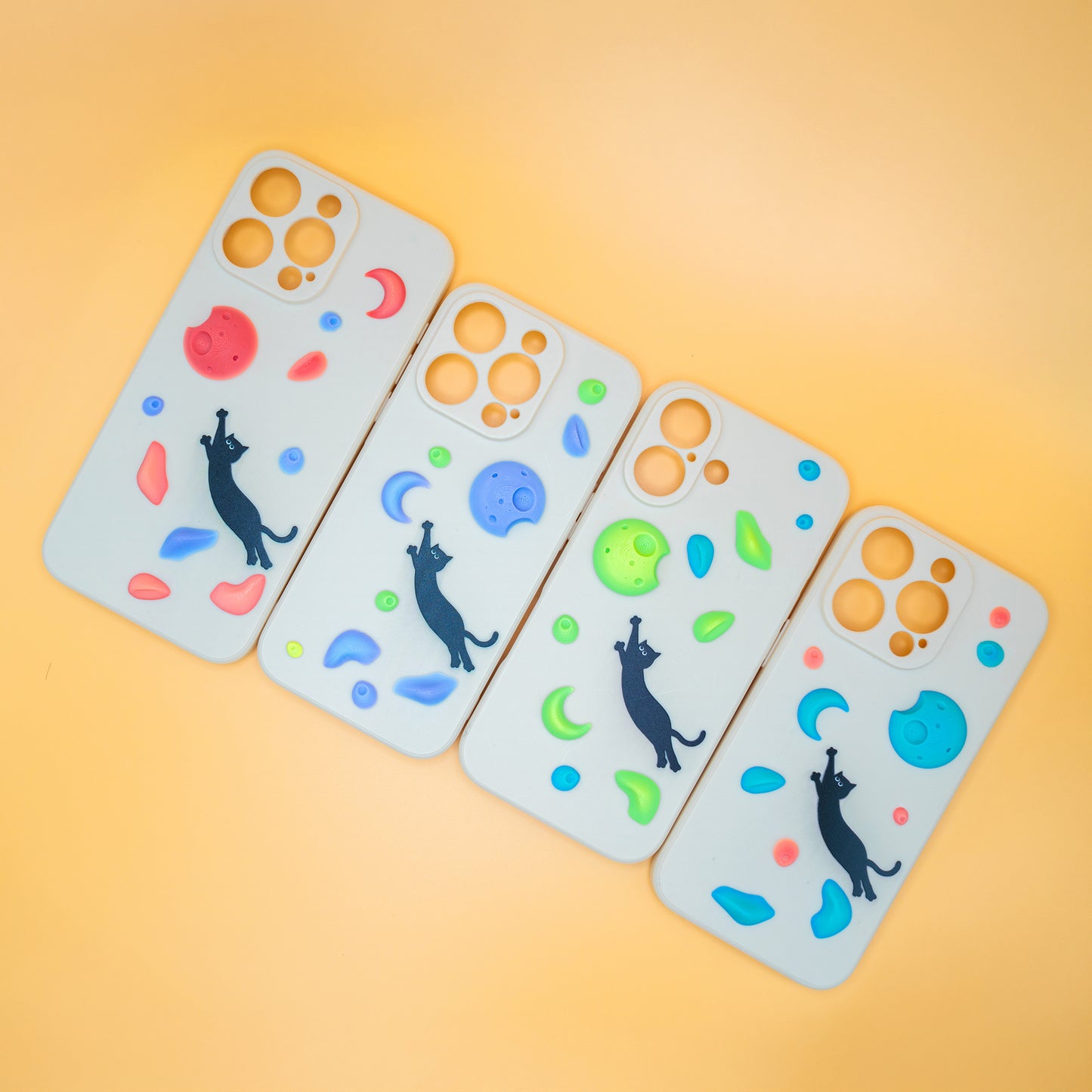 A black cat mid-dyno toward colorful climbing holds – printed on a fun and bold iPhone case. A great gift for climbers and cat lovers.