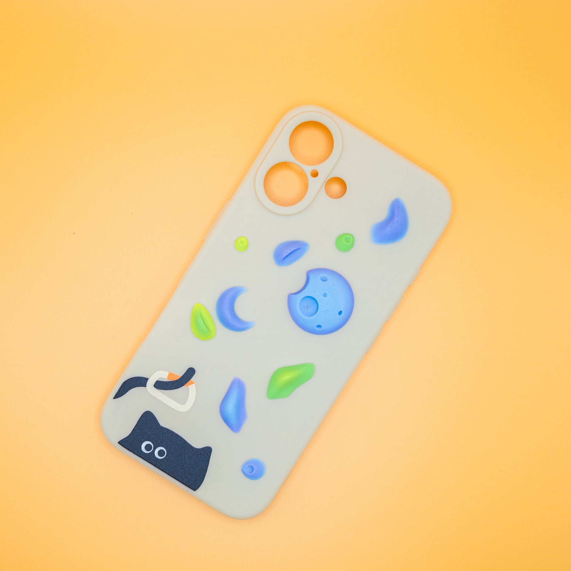 A black cat with a carabiner hanging from its tail, surrounded by colorful climbing holds – printed on a playful iPhone case. A fun gift for rock climbers and cat lovers.