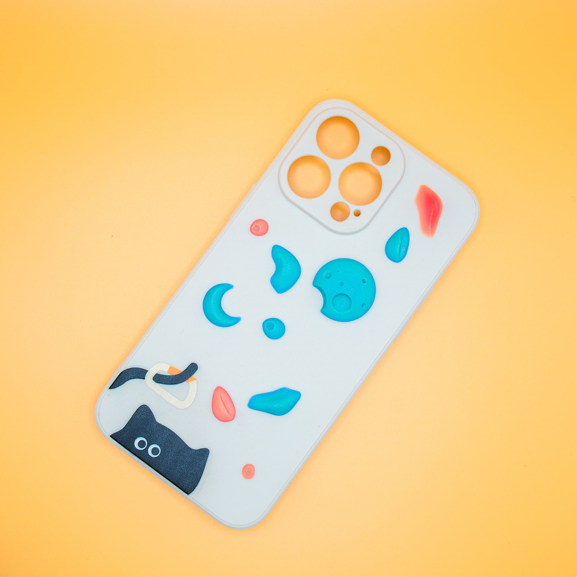 A black cat with a carabiner hanging from its tail, surrounded by colorful climbing holds – printed on a playful iPhone case. A fun gift for rock climbers and cat lovers.