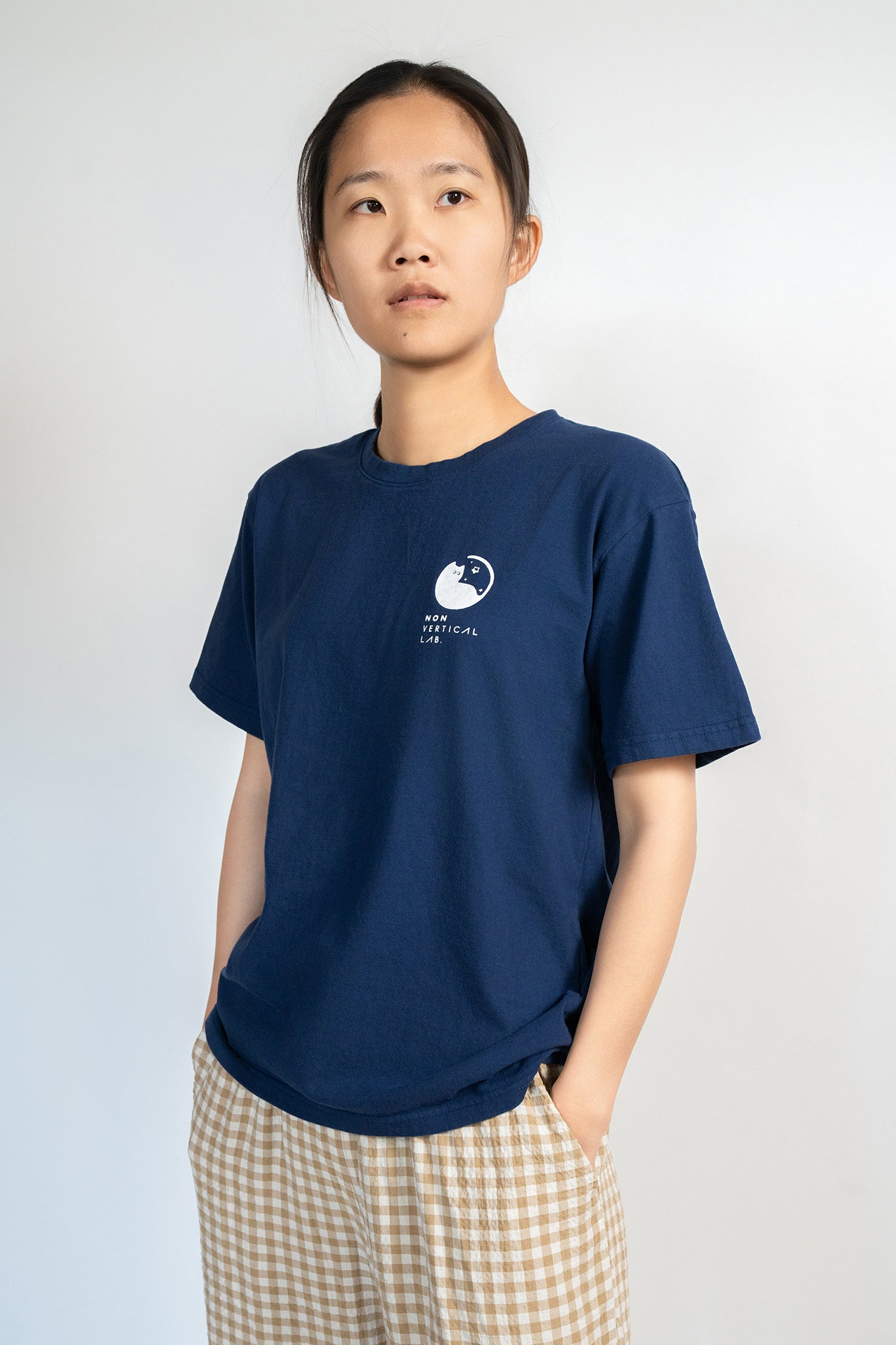Cosmic Leap Cat T-Shirt featuring a black cat mid-leap across space – a climbing-inspired gift for dyno lovers and rock climbers.