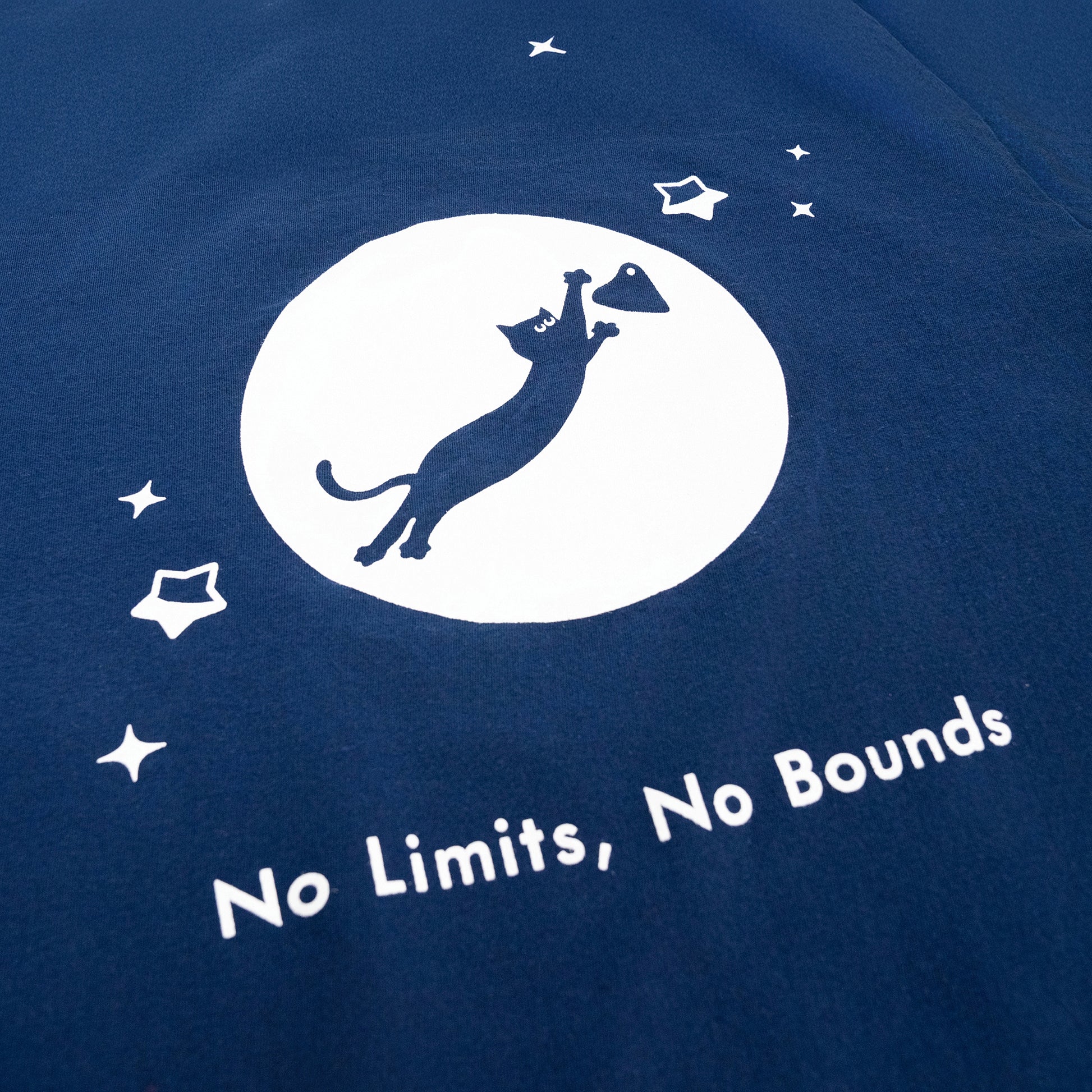 Cosmic Leap Cat T-Shirt featuring a black cat mid-leap across space – a climbing-inspired gift for dyno lovers and rock climbers.