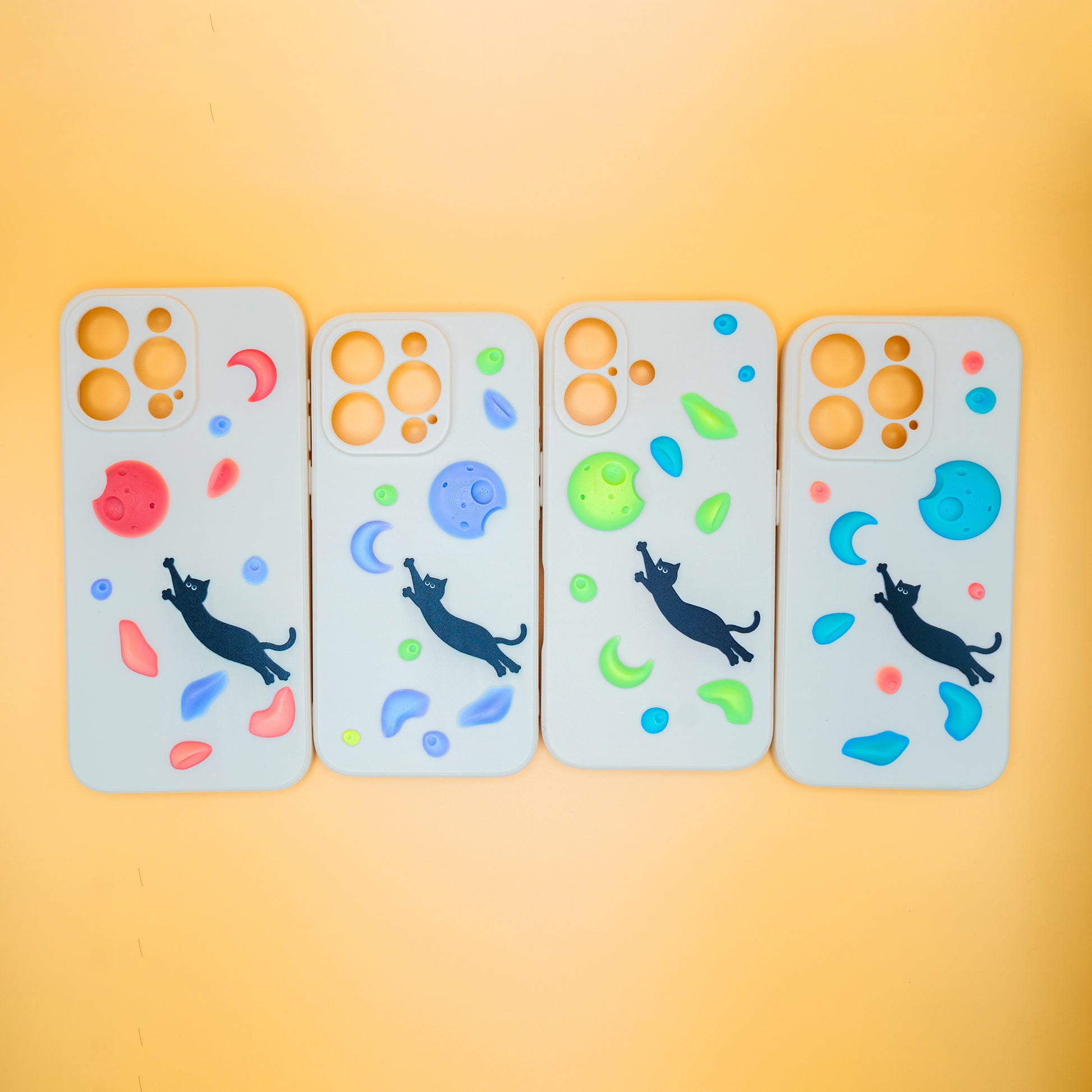 A black cat mid-dyno toward colorful climbing holds – printed on a fun and bold iPhone case. A great gift for climbers and cat lovers.