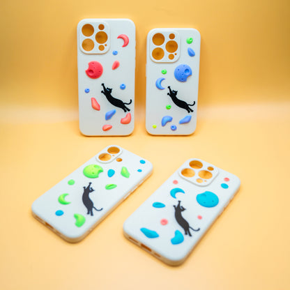 A black cat mid-dyno toward colorful climbing holds – printed on a fun and bold iPhone case. A great gift for climbers and cat lovers.