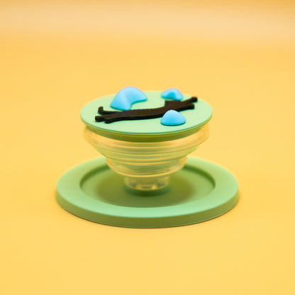 A black cat in mid-air dyno motion, leaping toward climbing holds – printed on a MagSafe phone grip. A bold gift for climbers and cat lovers. Designed by Non Vertical Lab.