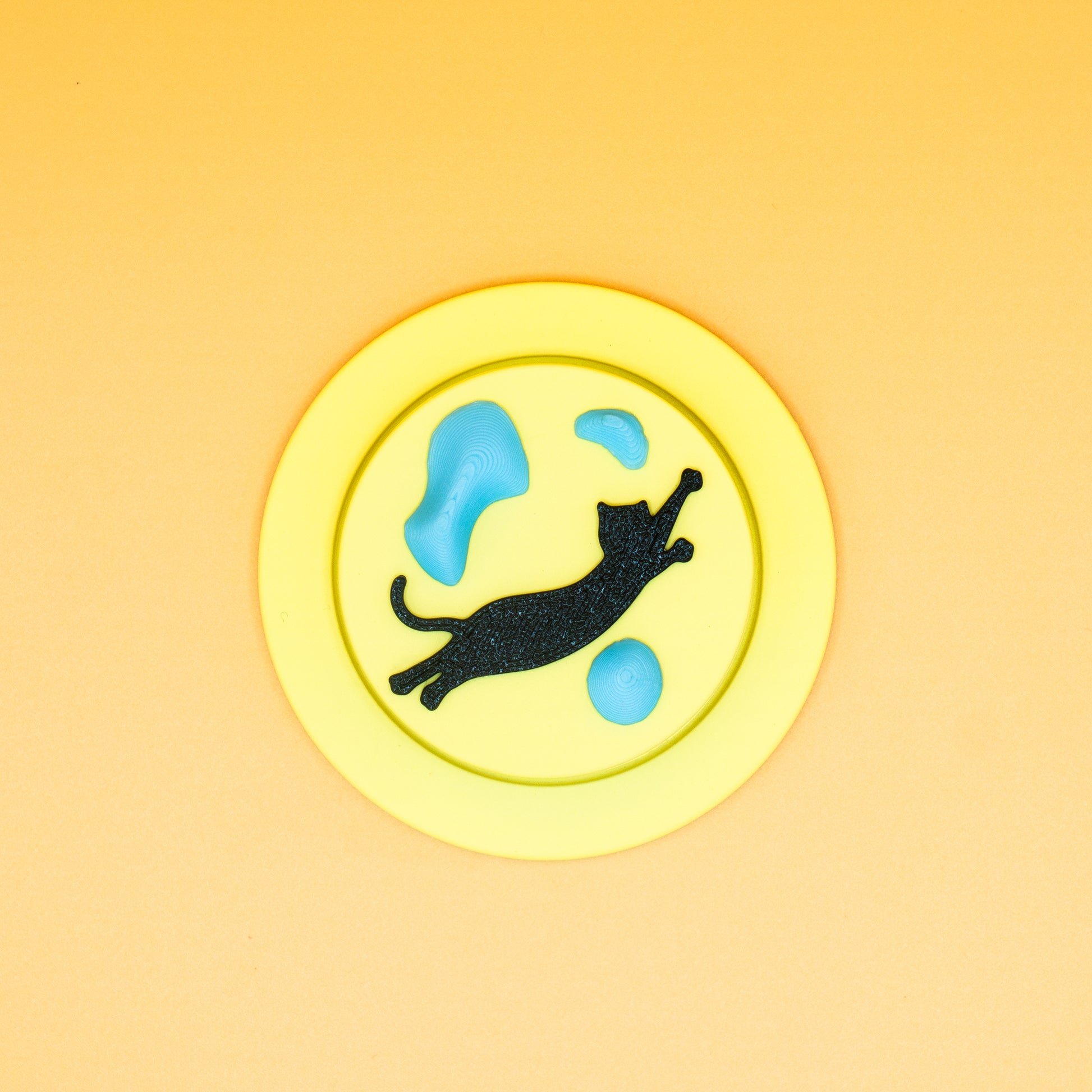 A black cat in mid-air dyno motion, leaping toward climbing holds – printed on a MagSafe phone grip. A bold gift for climbers and cat lovers. Designed by Non Vertical Lab.