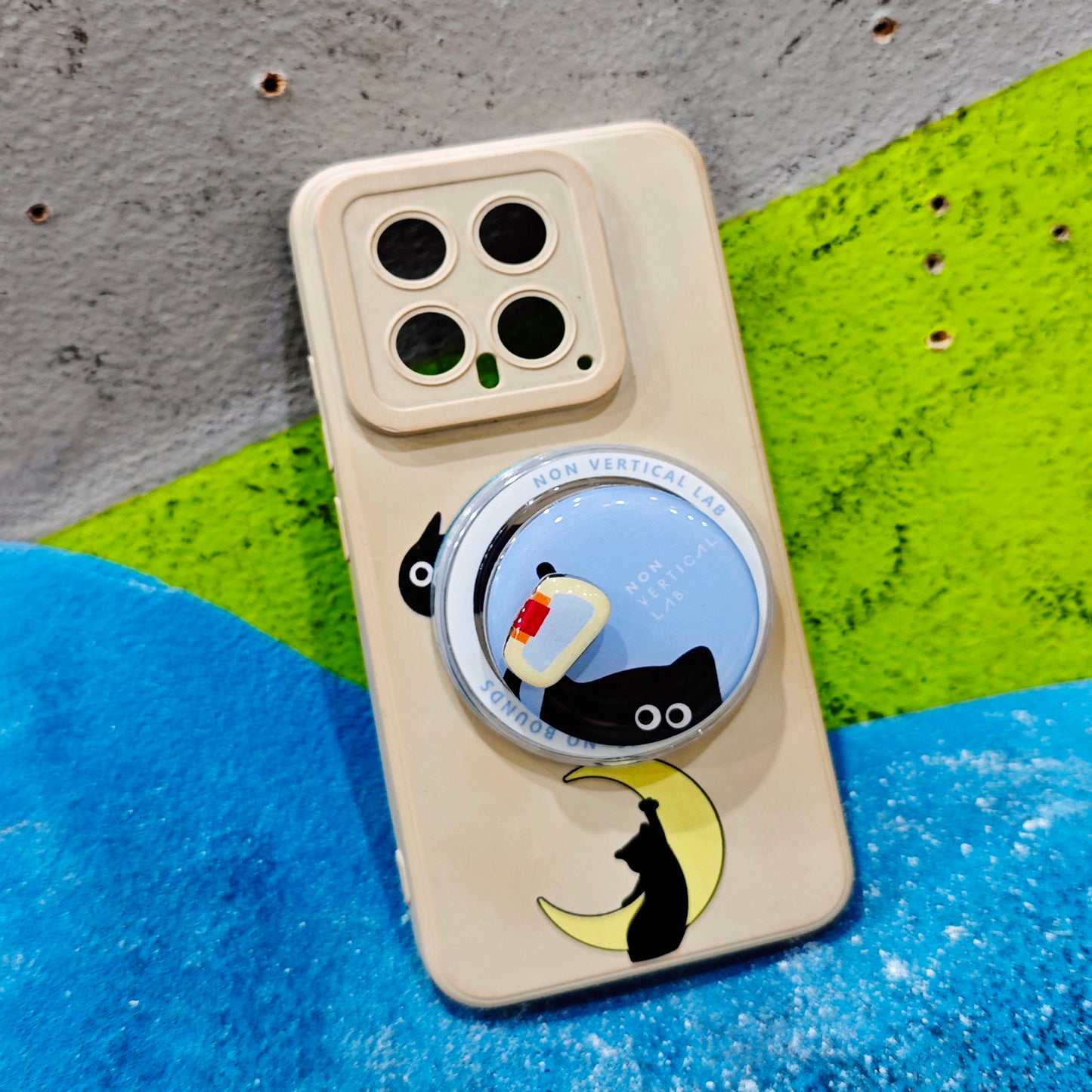 “Hold On, Cici!” black cat MagSafe grip inspired by climbing holds – a fun and functional gift for rock climbers, boulderers, and cat lovers.