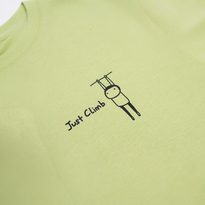 “Just Climb” graphic T-shirt featuring a cute cat and climbing elements – a fun and bold gift for rock climbers.