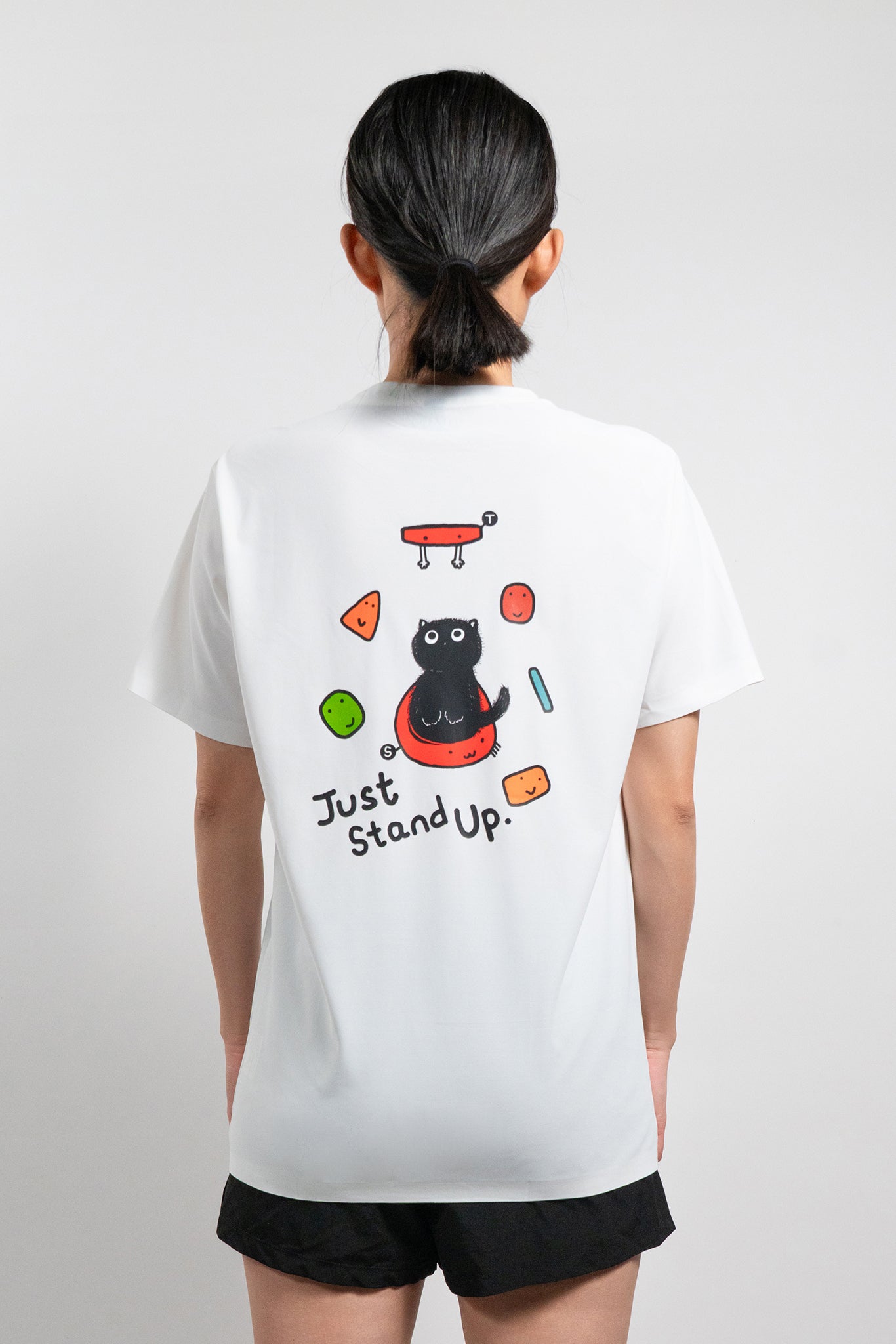 Black cat on a slab with the words “Just Stand Up” – perfect gift for climbers who’d rather smear than dyno.