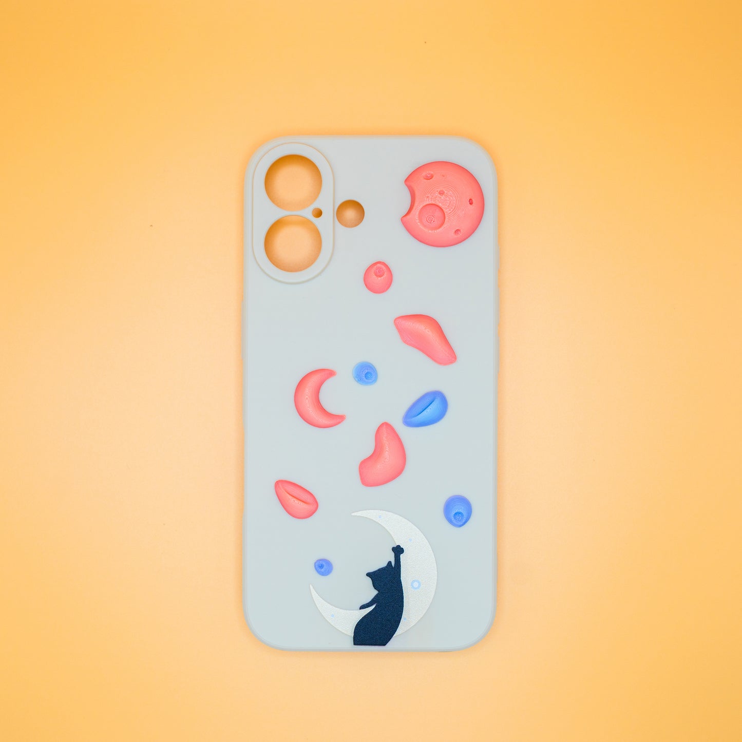 A black cat reaching up from a moon toward floating climbing holds – printed on a playful iPhone case, designed by Non Vertical Lab. A fun and thoughtful gift for climbers, cat lovers, and anyone who needs a little extra grip in life.