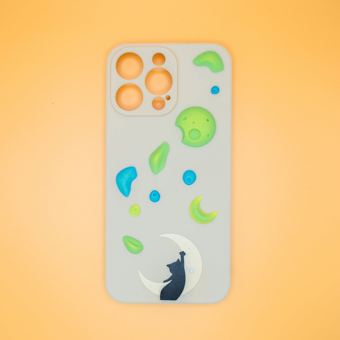 A black cat reaching up from a moon toward floating climbing holds – printed on a playful iPhone case, designed by Non Vertical Lab. A fun and thoughtful gift for climbers, cat lovers, and anyone who needs a little extra grip in life.